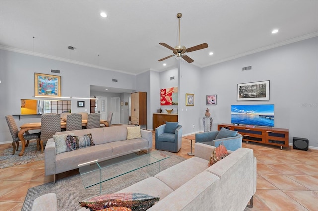 tiled living room featuring ceiling fan, a towering ceiling, and ornamental molding