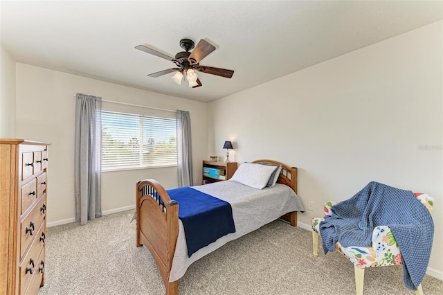 bedroom with light colored carpet and ceiling fan