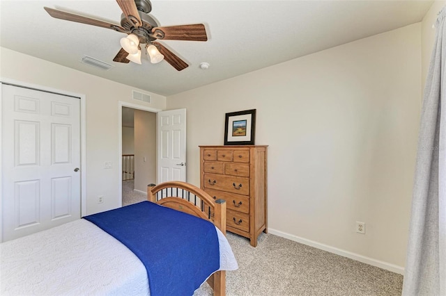 carpeted bedroom with ceiling fan