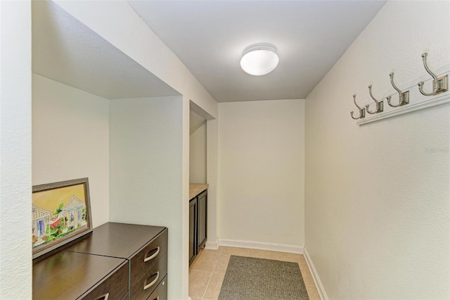 interior space with light tile patterned flooring