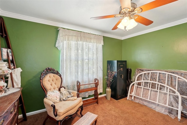 carpeted bedroom featuring crown molding and ceiling fan