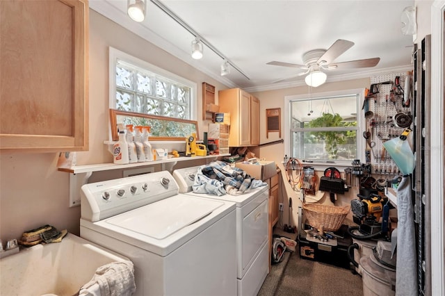 laundry area featuring sink, ornamental molding, ceiling fan, independent washer and dryer, and track lighting