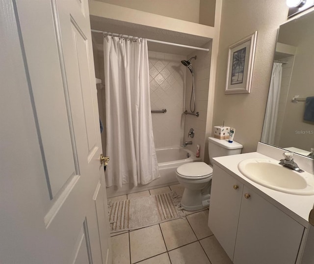 full bathroom with vanity, tile patterned floors, shower / bath combination with curtain, and toilet