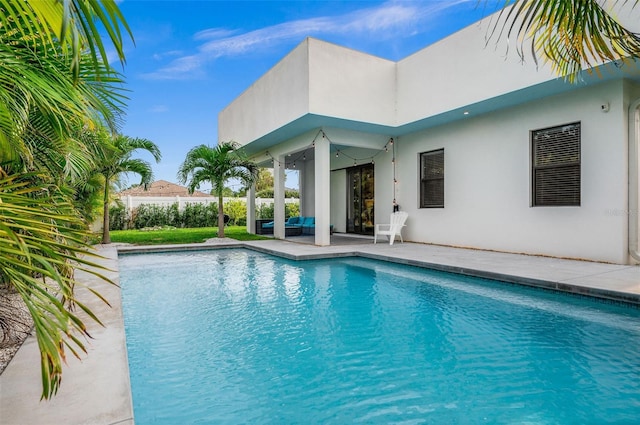 view of pool featuring a patio