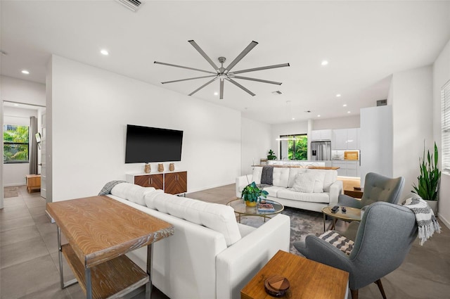 living room with ceiling fan