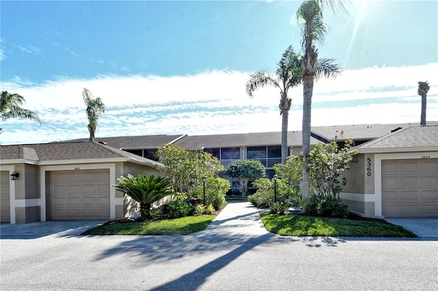 single story home featuring a garage