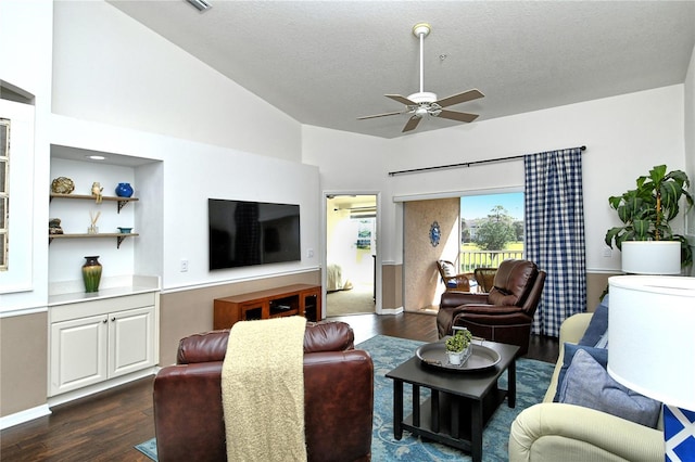 living room featuring dark hardwood / wood-style flooring, a textured ceiling, vaulted ceiling, and ceiling fan