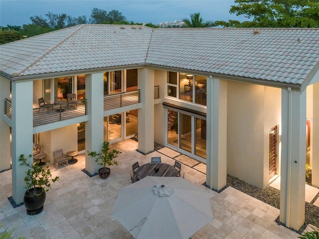 rear view of property with a patio area