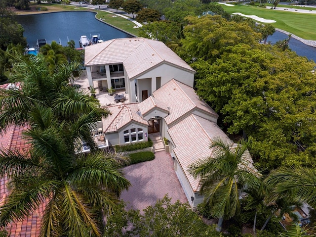 birds eye view of property featuring a water view