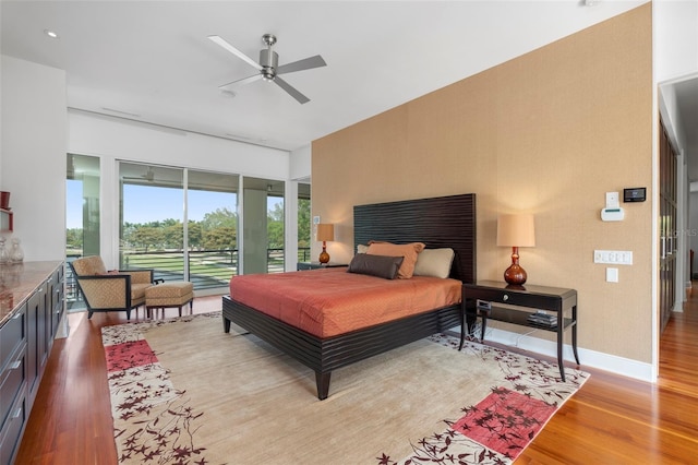 bedroom featuring ceiling fan, access to exterior, and light wood-type flooring