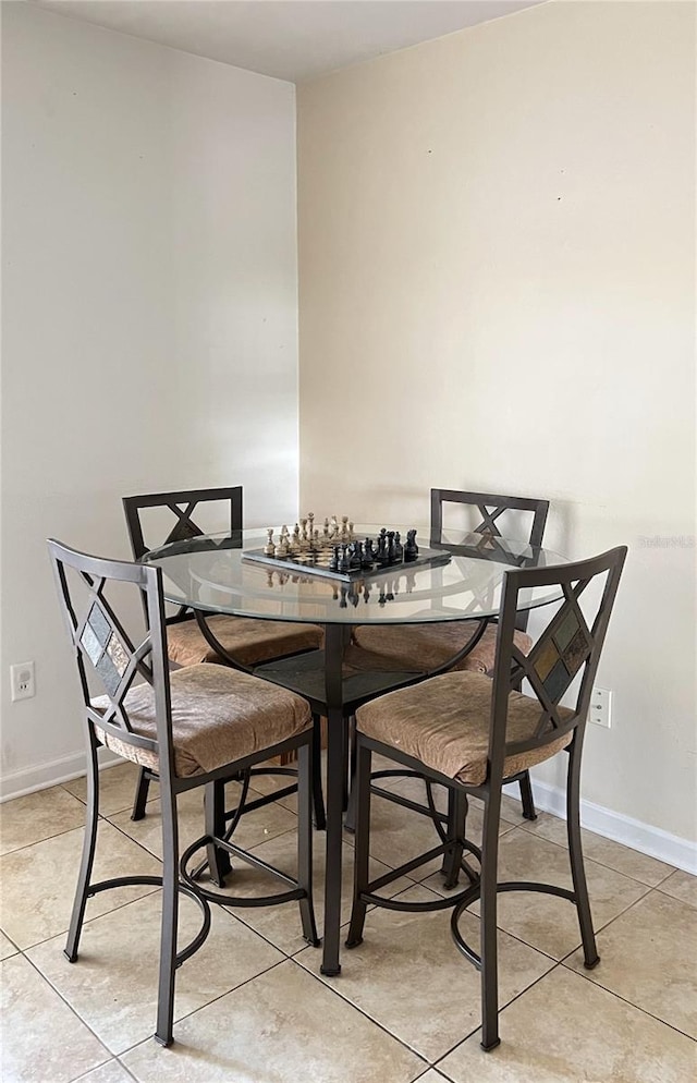 view of tiled dining space