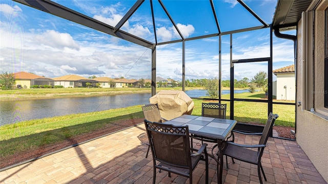 sunroom with a water view