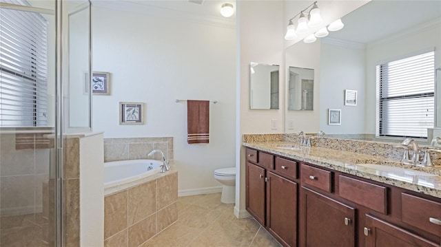 full bathroom featuring tile patterned floors, toilet, crown molding, vanity, and independent shower and bath