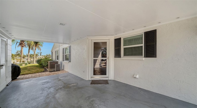 view of patio with central AC unit