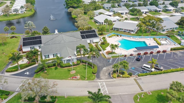 drone / aerial view with a water view