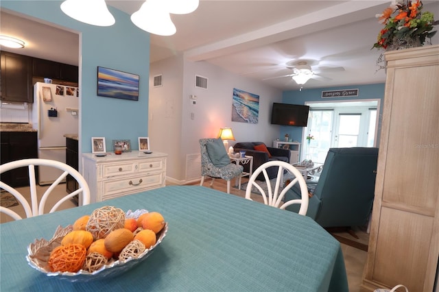 dining room with ceiling fan