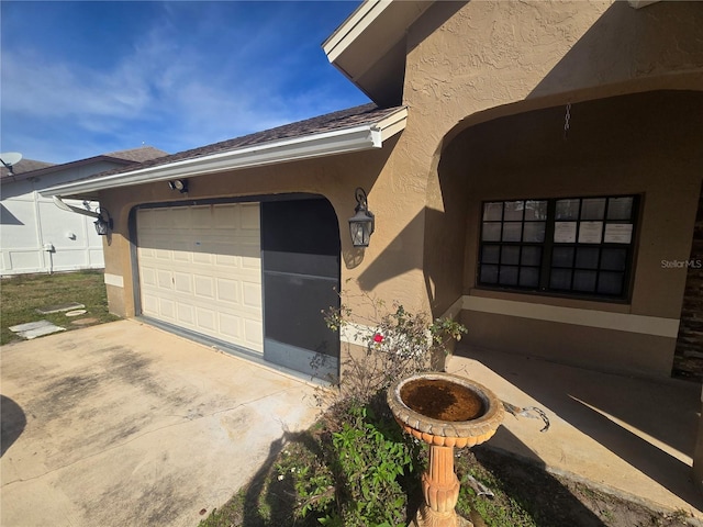 exterior space with a garage