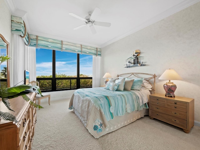 bedroom with light carpet, crown molding, expansive windows, and ceiling fan