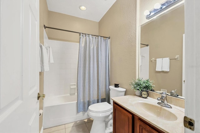 full bathroom with tile patterned floors, toilet, vanity, and shower / bath combo