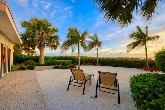 view of patio terrace at dusk