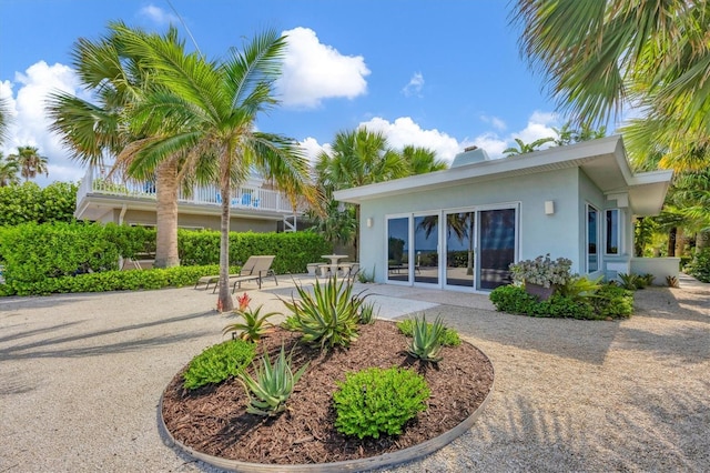 rear view of house featuring a patio