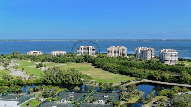 drone / aerial view with a view of city and a water view