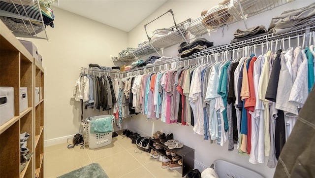 spacious closet featuring tile patterned flooring