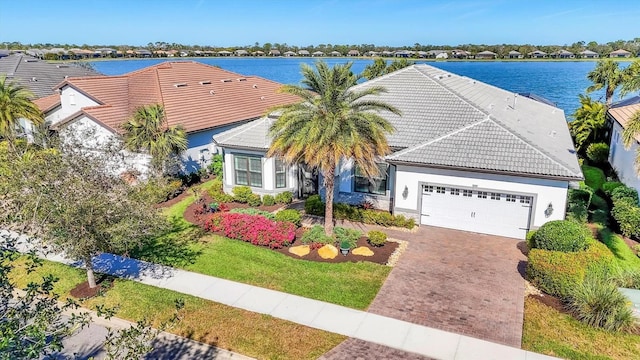 drone / aerial view with a water view