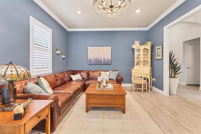 living room with ornamental molding and light wood-type flooring