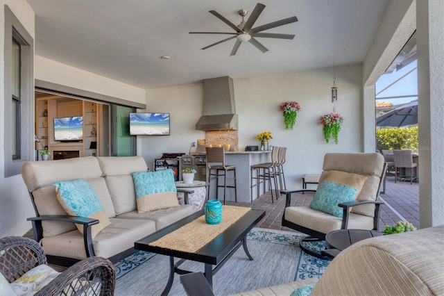 living room featuring ceiling fan