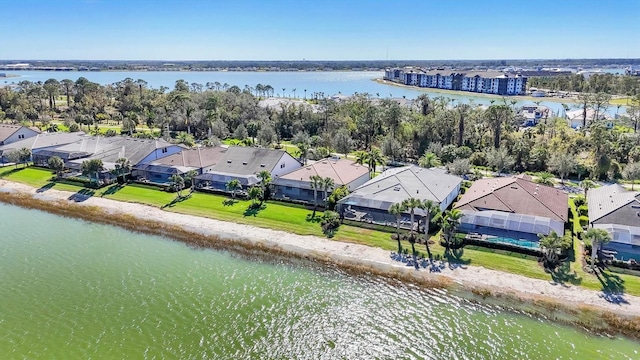 drone / aerial view with a water view