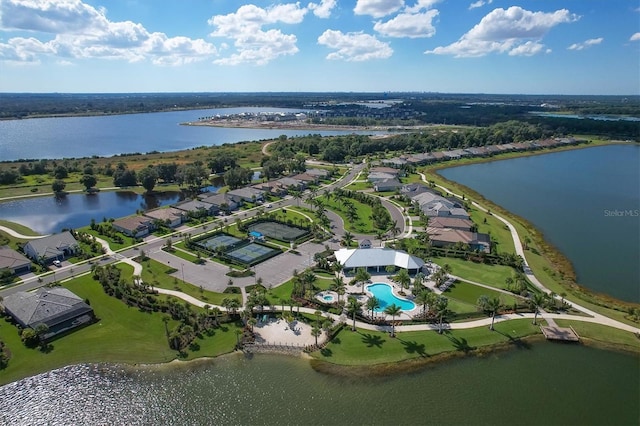 birds eye view of property featuring a water view