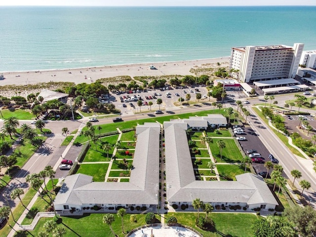 aerial view with a view of the beach and a water view