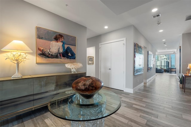 foyer entrance featuring light hardwood / wood-style flooring