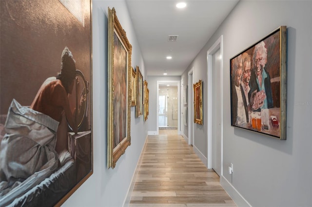 hallway featuring light hardwood / wood-style floors