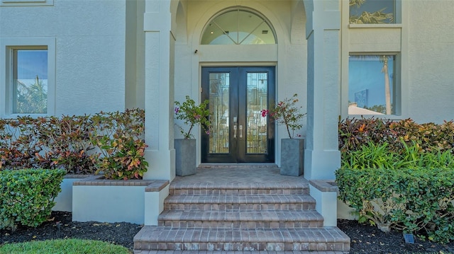 entrance to property with french doors