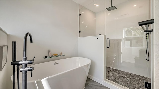 bathroom with independent shower and bath