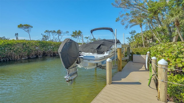 view of dock with a water view