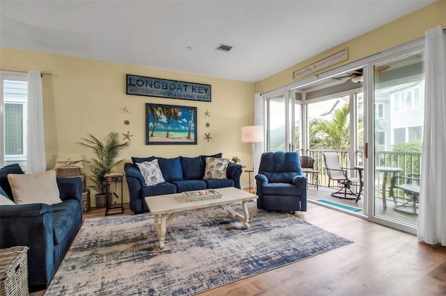 living room with light hardwood / wood-style floors