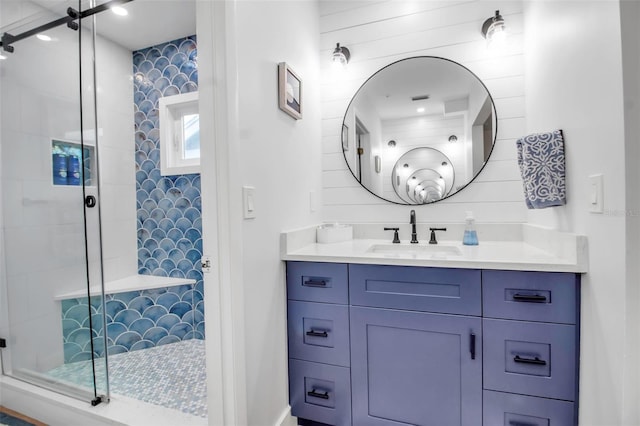 bathroom with vanity and walk in shower