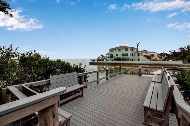 wooden terrace with a water view