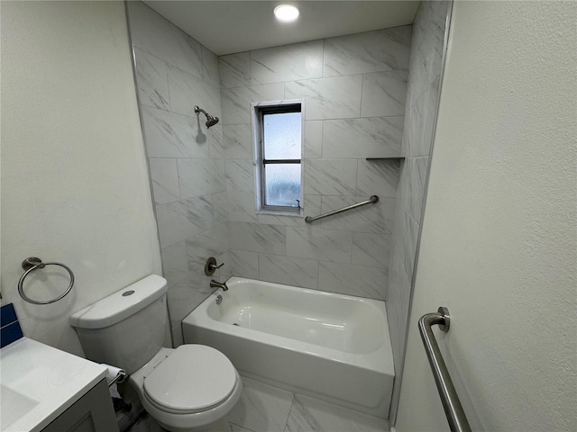 full bathroom featuring vanity, toilet, and tiled shower / bath