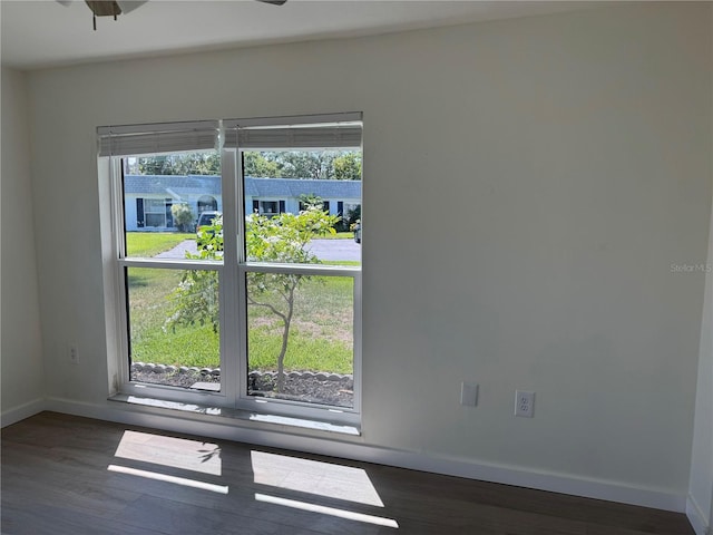 3813 42nd St W Unit 37, Bradenton, FL 34205 - unfurnished room with baseboards and dark wood finished floors
