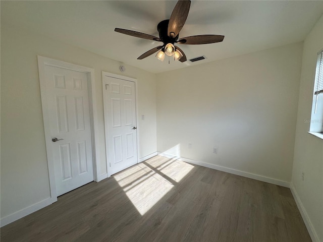 3813 42nd St W Unit 37, Bradenton, FL 34205 - unfurnished bedroom with wood finished floors and ceiling fan