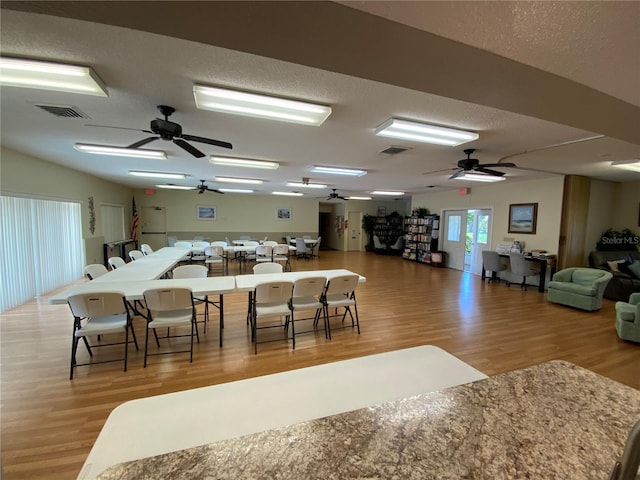 3813 42nd St W Unit 37, Bradenton, FL 34205 - kitchen with a ceiling fan, wood finished floors, and a textured ceiling