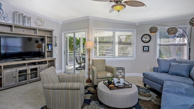 living room featuring ceiling fan and ornamental molding