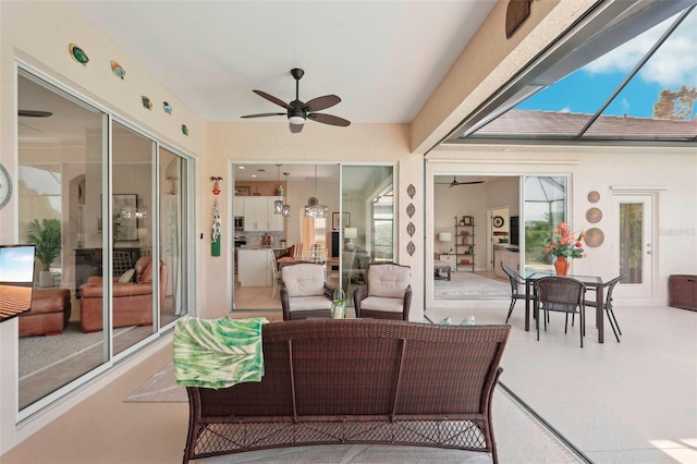 view of patio featuring ceiling fan and an outdoor hangout area