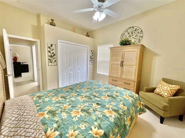 bedroom featuring ceiling fan and a closet