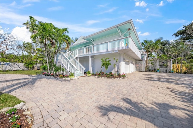 view of front of house with a garage and covered porch