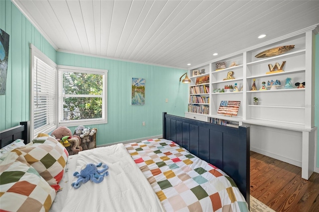 bedroom with dark wood-type flooring